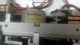 Original Sankyo motor label in a donor deck for comparison